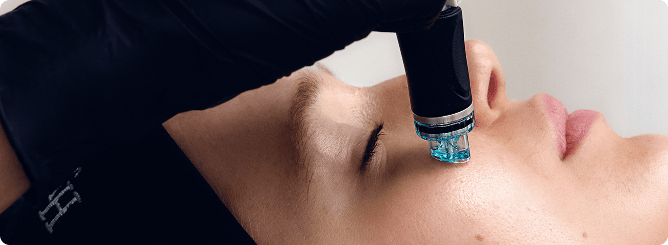 Hydrafacial treatment being applied to the face